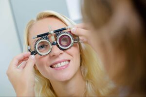 woman getting a refraction eye exam