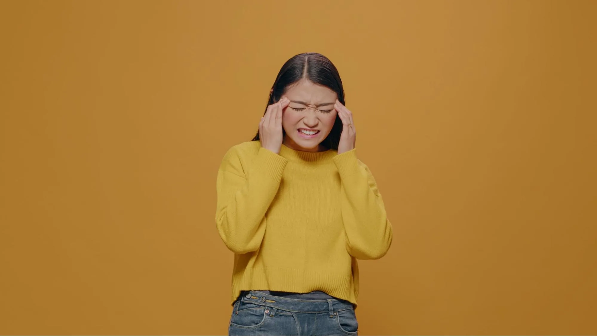 woman wondering what causes ocular migraines​